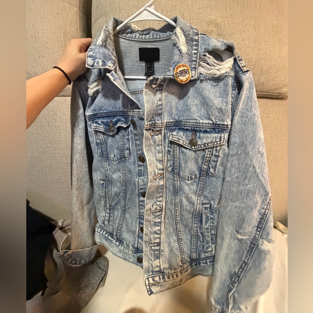 Distressed Blue Denim Jacket with pin